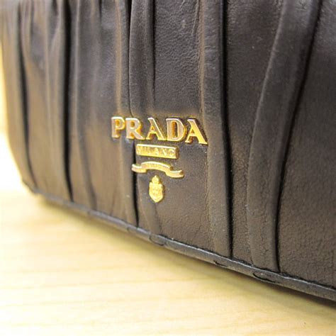 prada ruched wallet|prada wallet red inside.